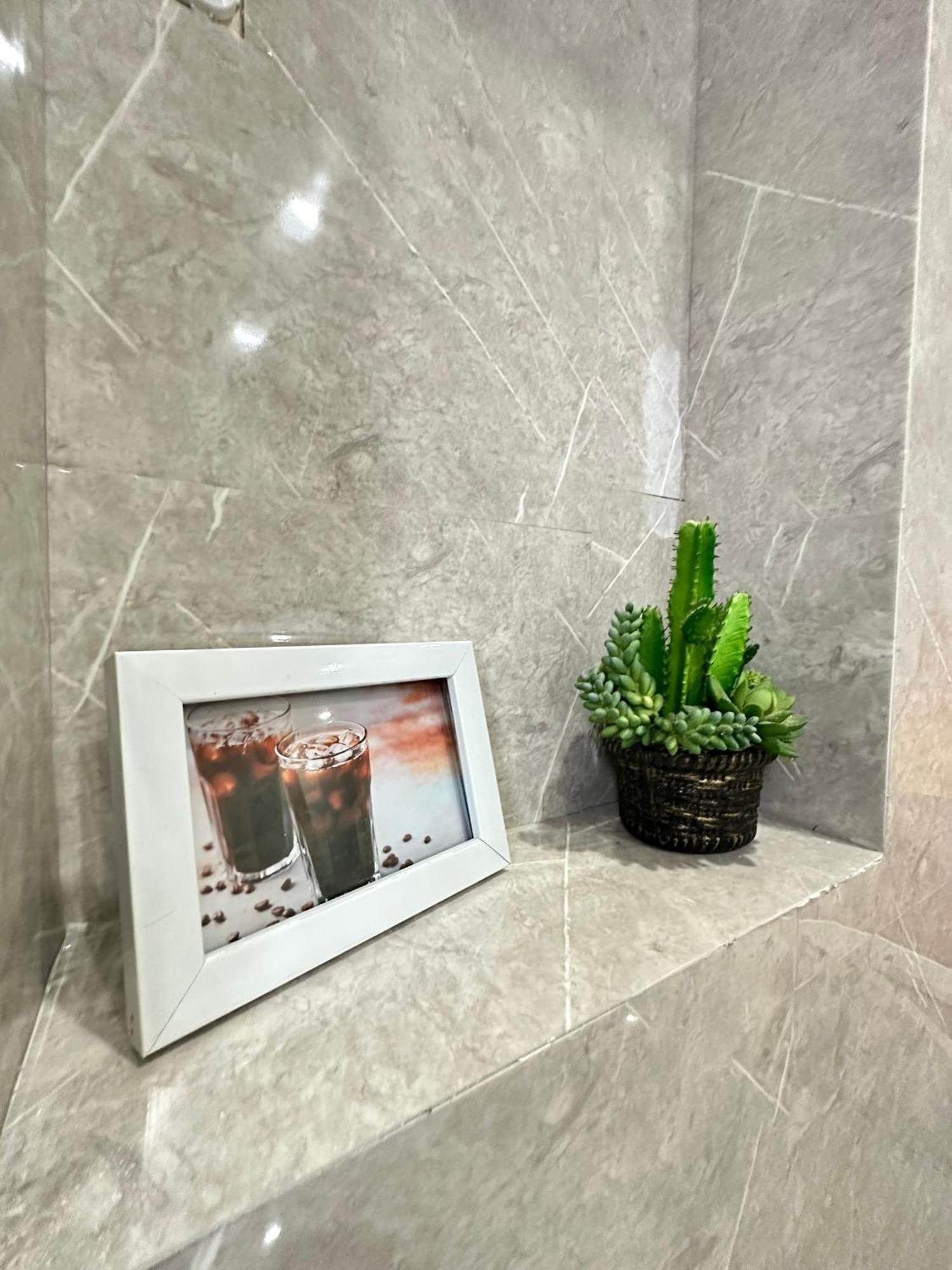 Rich Hotel Кан То Екстериор снимка