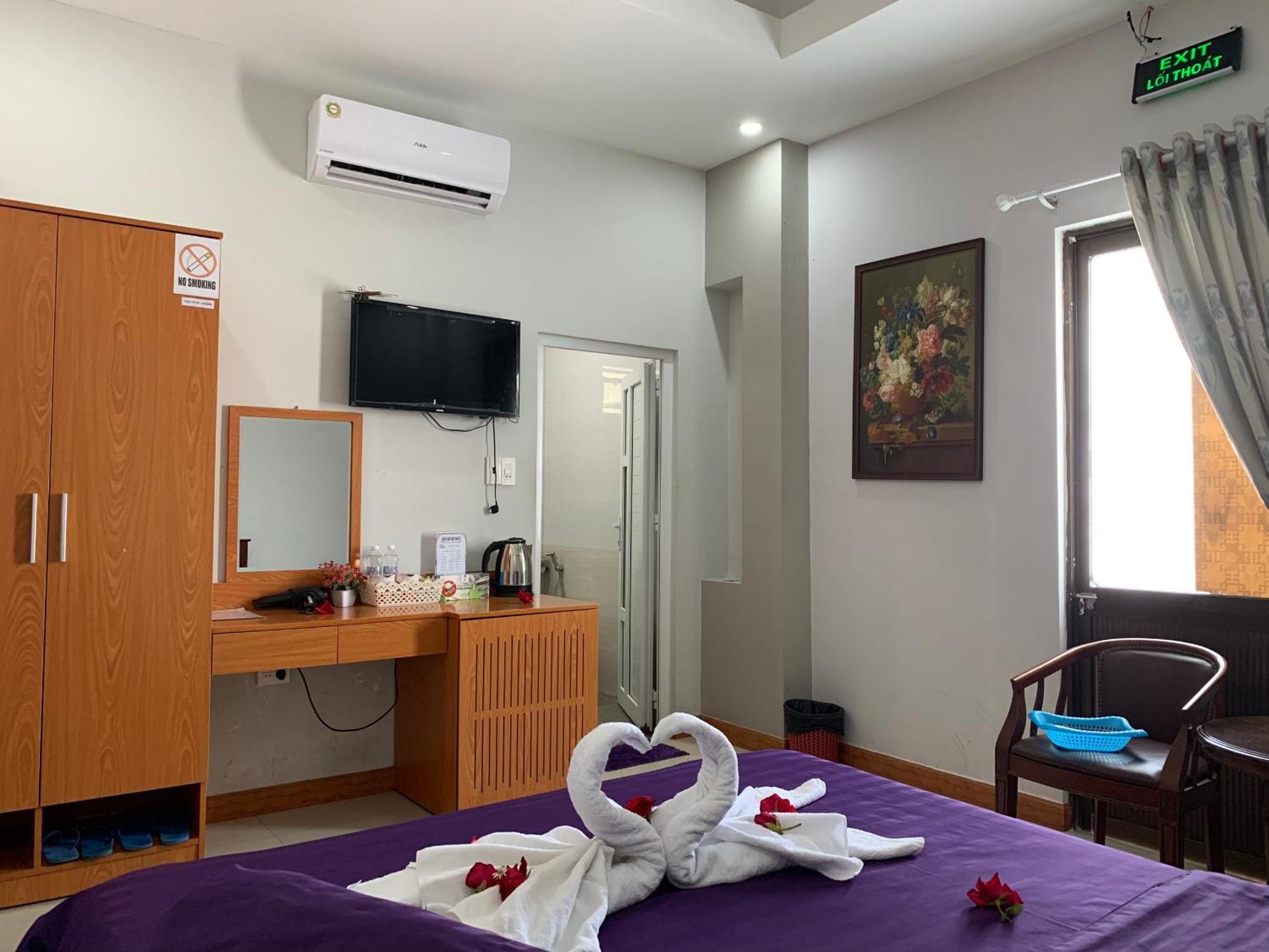 Rich Hotel Кан То Екстериор снимка